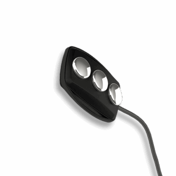 Angled view of black Tablet 03 remote electrode with three silver buttons and cable.